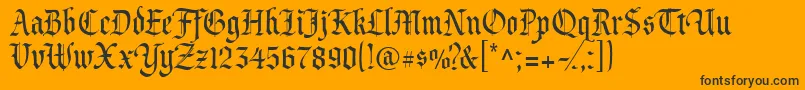 Princevaliant-Schriftart – Schwarze Schriften auf orangefarbenem Hintergrund