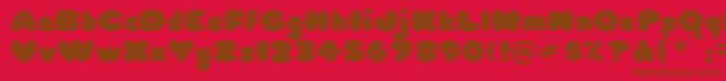 Babycakes Font – Brown Fonts on Red Background