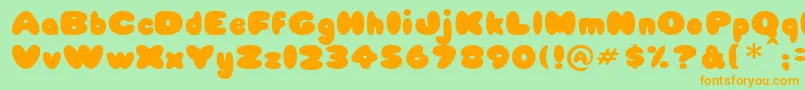 Babycakes Font – Orange Fonts on Green Background