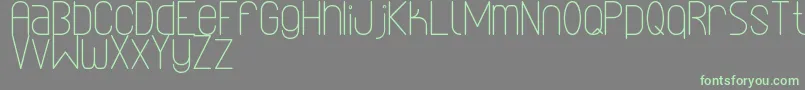 Czcionka LinealSimplesSt – zielone czcionki na szarym tle