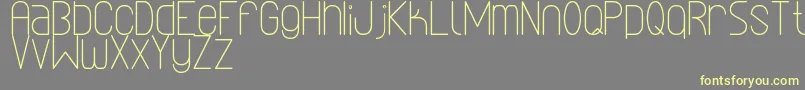 LinealSimplesSt Font – Yellow Fonts on Gray Background