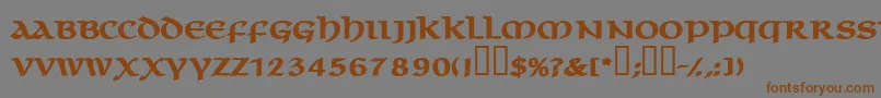 フォントMacedoncapssskBold – 茶色の文字が灰色の背景にあります。