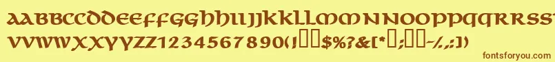 フォントMacedoncapssskBold – 茶色の文字が黄色の背景にあります。