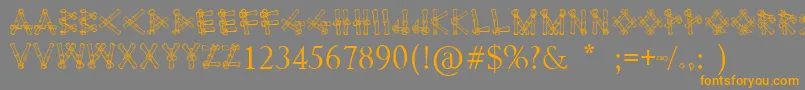 フォントBamboodesaipan – オレンジの文字は灰色の背景にあります。