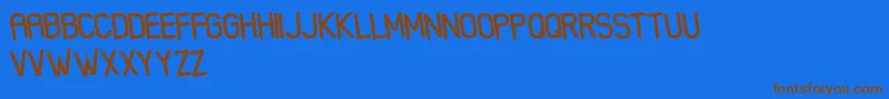 XenikFreePromo Font – Brown Fonts on Blue Background