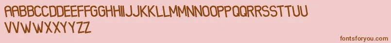 XenikFreePromo Font – Brown Fonts on Pink Background