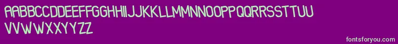 XenikFreePromo Font – Green Fonts on Purple Background