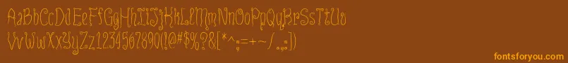 Czcionka InnsmouthPlain – pomarańczowe czcionki na brązowym tle