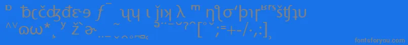 フォントStoneSansPhoneticAlternate – 青い背景に灰色の文字