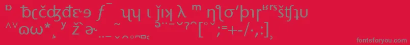 フォントStoneSansPhoneticAlternate – 赤い背景に灰色の文字