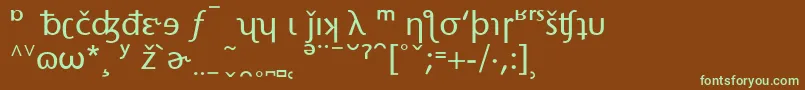 フォントStoneSansPhoneticAlternate – 緑色の文字が茶色の背景にあります。