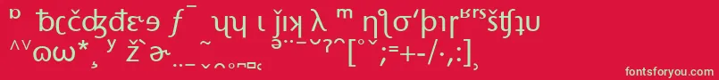 フォントStoneSansPhoneticAlternate – 赤い背景に緑の文字