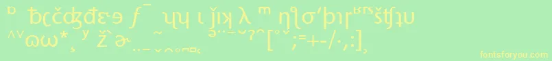 StoneSansPhoneticAlternate-Schriftart – Gelbe Schriften auf grünem Hintergrund