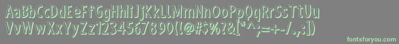 ShakyHandSomeComic3D-Schriftart – Grüne Schriften auf grauem Hintergrund