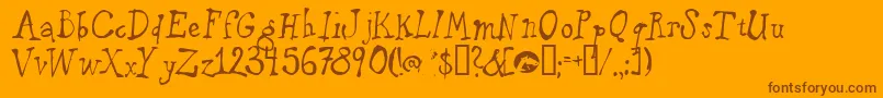 Puppetface Font – Brown Fonts on Orange Background