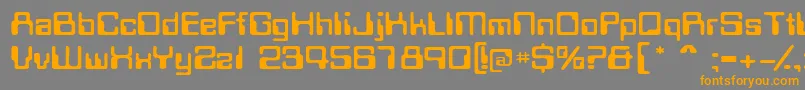 フォントMagcardextendedssk – オレンジの文字は灰色の背景にあります。