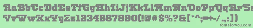 フォントOtisPosterRegular – 緑の背景に灰色の文字