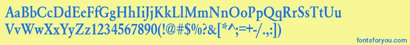 Whittiedmediumc Font – Blue Fonts on Yellow Background