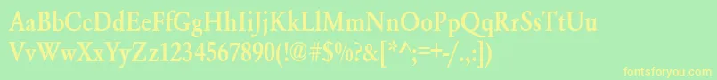 Whittiedmediumc Font – Yellow Fonts on Green Background