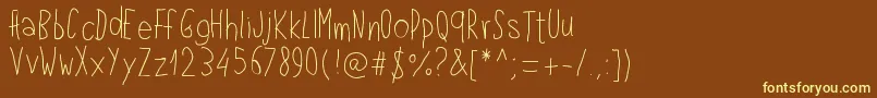 Pwlefthand Font – Yellow Fonts on Brown Background