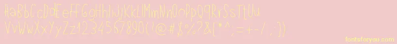 Fonte Pwlefthand – fontes amarelas em um fundo rosa