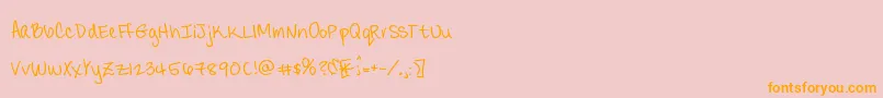 Candydelish Font – Orange Fonts on Pink Background