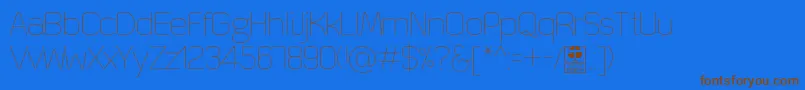 QuizmaThinDemo Font – Brown Fonts on Blue Background
