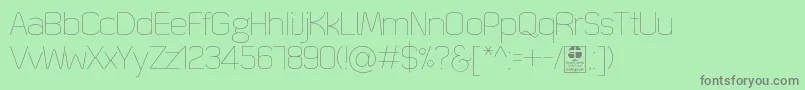 QuizmaThinDemo Font – Gray Fonts on Green Background