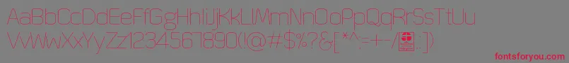 QuizmaThinDemo Font – Red Fonts on Gray Background