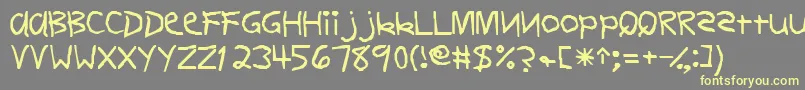 Firstgradedisplaycapsssk Font – Yellow Fonts on Gray Background