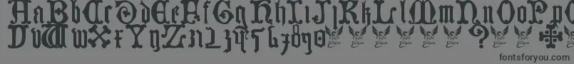 フォントGermanBlackletters15thC – 黒い文字の灰色の背景