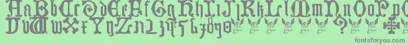 GermanBlackletters15thC-Schriftart – Graue Schriften auf grünem Hintergrund