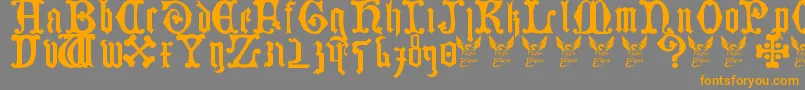 フォントGermanBlackletters15thC – オレンジの文字は灰色の背景にあります。