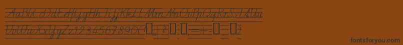 Schulschriftcl4-fontti – mustat fontit ruskealla taustalla