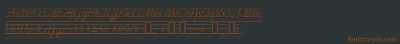 フォントSchulschriftcl4 – 黒い背景に茶色のフォント