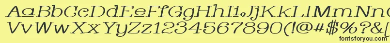 WhackadooUpperWideItalic Font – Black Fonts on Yellow Background