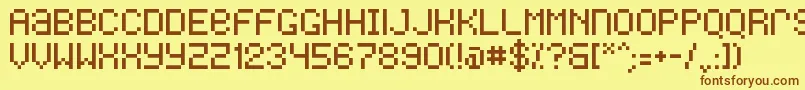 フォントFreon – 茶色の文字が黄色の背景にあります。