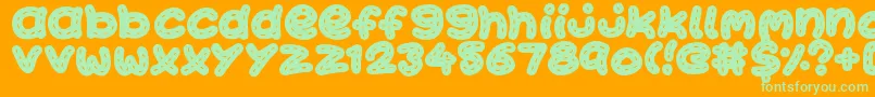 KawaiiStitch Font – Green Fonts on Orange Background