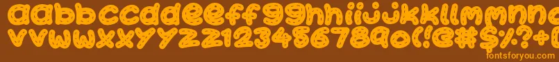 KawaiiStitch Font – Orange Fonts on Brown Background