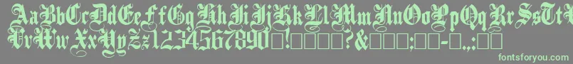 PlainblackNormal-Schriftart – Grüne Schriften auf grauem Hintergrund