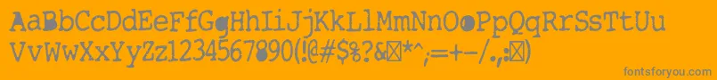 Tightwriter Font – Gray Fonts on Orange Background
