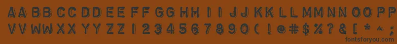 Шрифт Chromosomeheavy – чёрные шрифты на коричневом фоне
