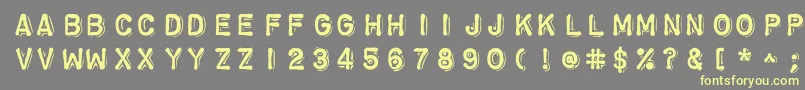Chromosomeheavy-Schriftart – Gelbe Schriften auf grauem Hintergrund