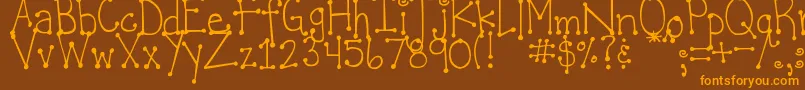 DjbItsFullOfDots Font – Orange Fonts on Brown Background