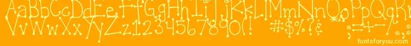 Czcionka DjbItsFullOfDots – żółte czcionki na pomarańczowym tle