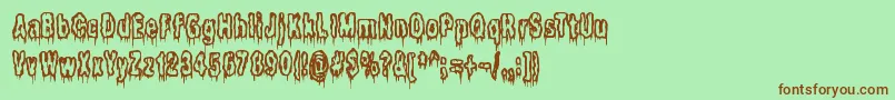 Itlivesintheswamp Font – Brown Fonts on Green Background