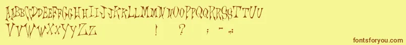 Scrawlings Font – Brown Fonts on Yellow Background