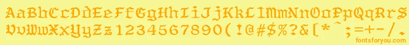 フォントOldeworldBoldWd – オレンジの文字が黄色の背景にあります。