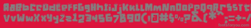 DPuntillasETiptoesSquid-Schriftart – Graue Schriften auf rotem Hintergrund