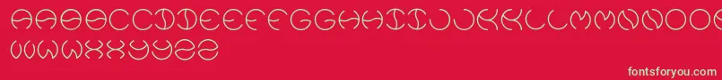 フォントKristina – 赤い背景に緑の文字